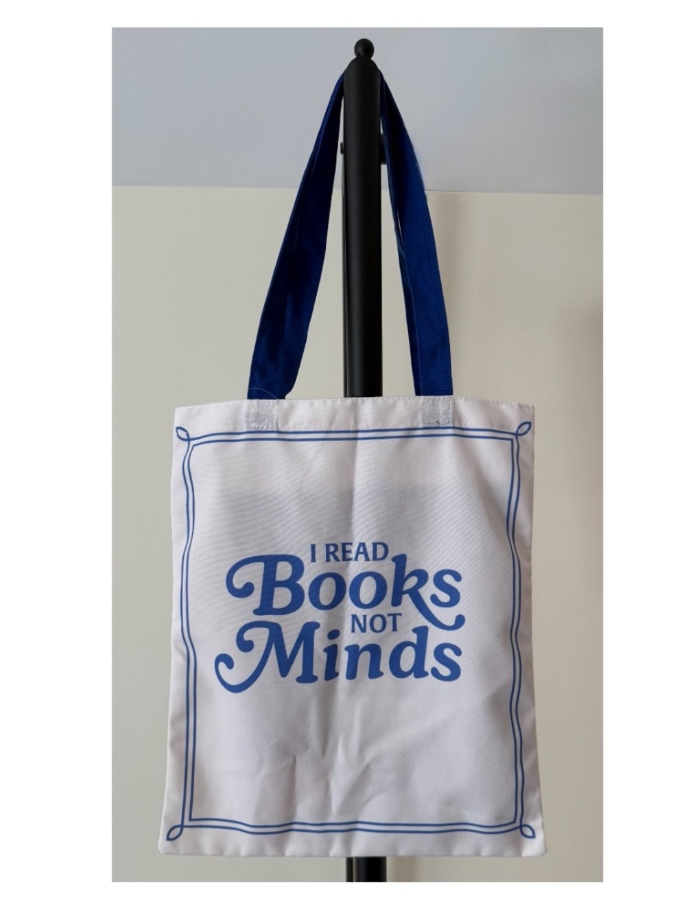 White and Blue Canvas Tote Bag with 'I Read Books Not Minds' Print